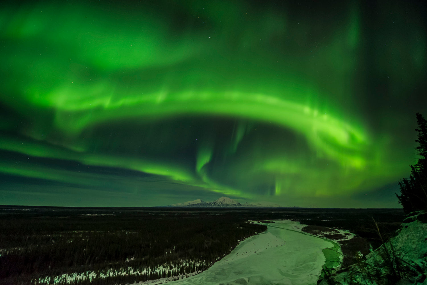 Aurora halo glowing over the Copper River Basin in Alaska