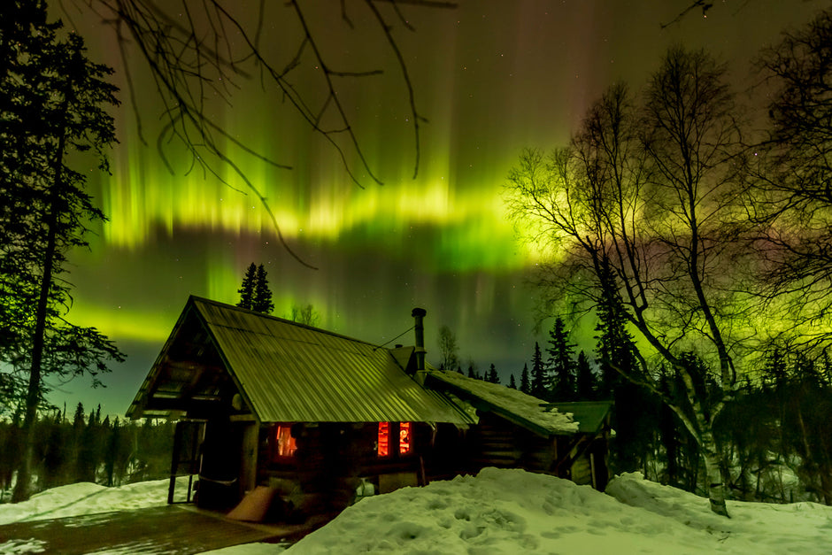 Aurora borealis curtain waves across Alaska landscape in dramatic finale