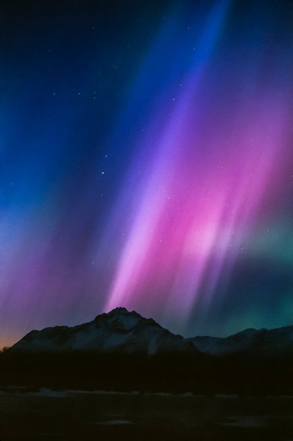 Great pink aurora tower rising over Alaska portrait fine art I